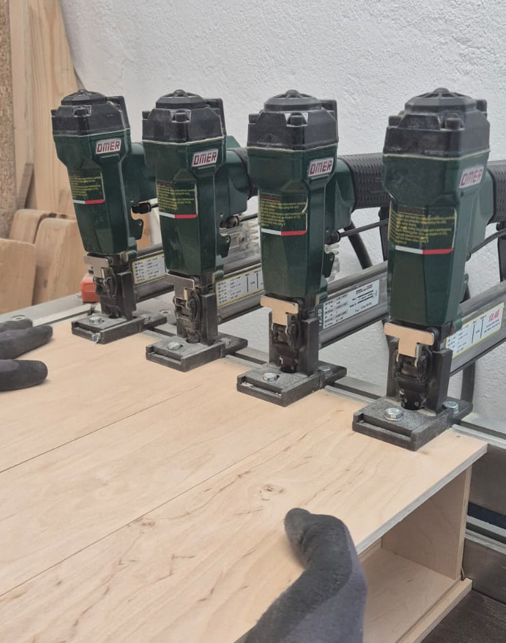 Pneumatic staplers assembling wooden panels